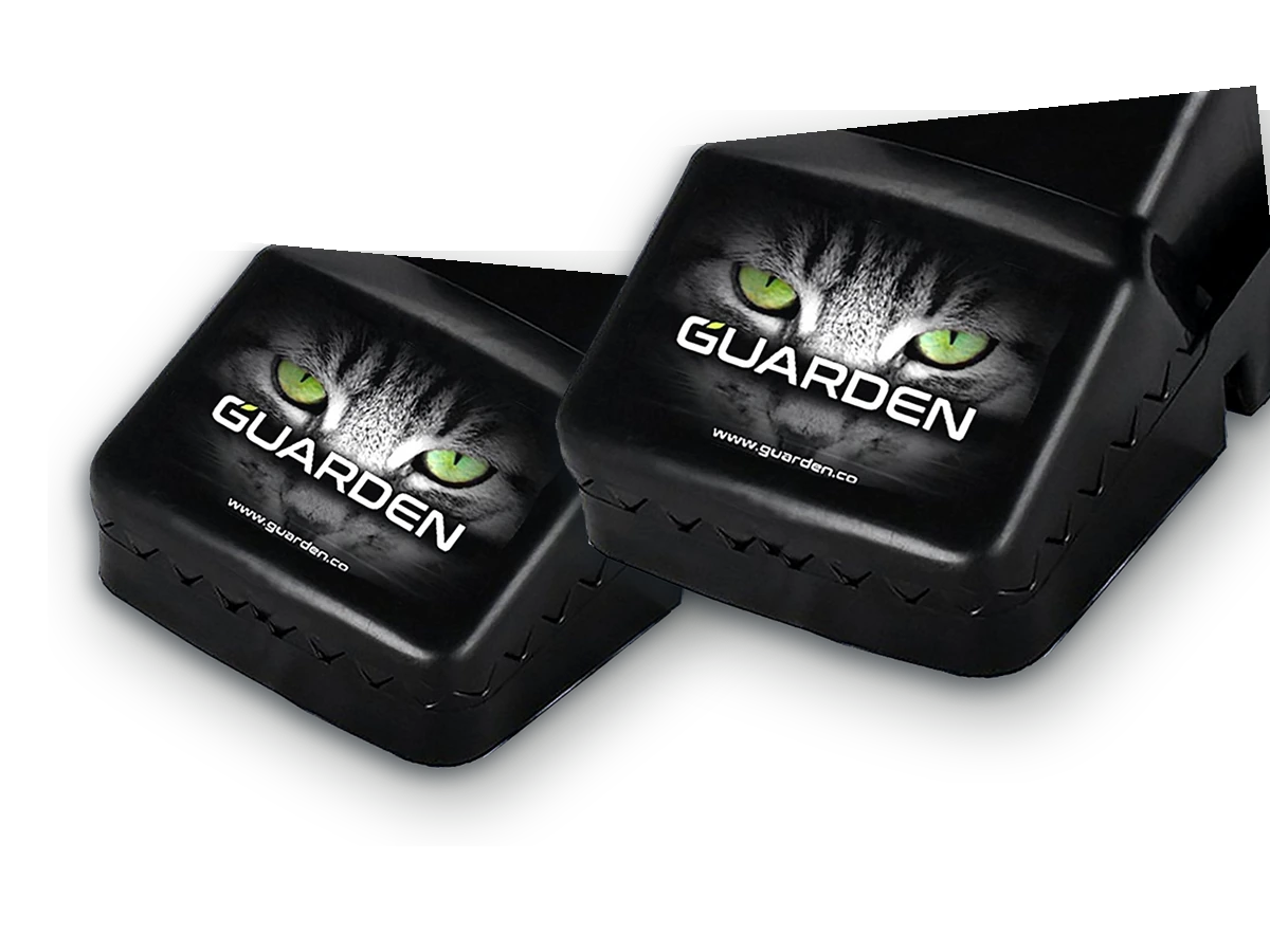 Two reusable Guarden rat traps arranged together